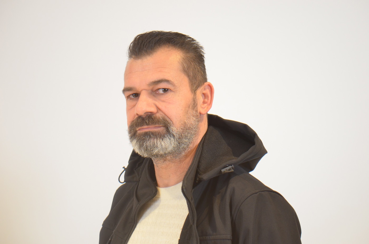 AHMET A.