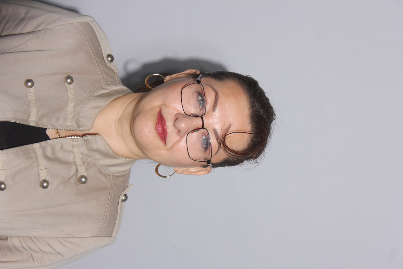 ARZU E.